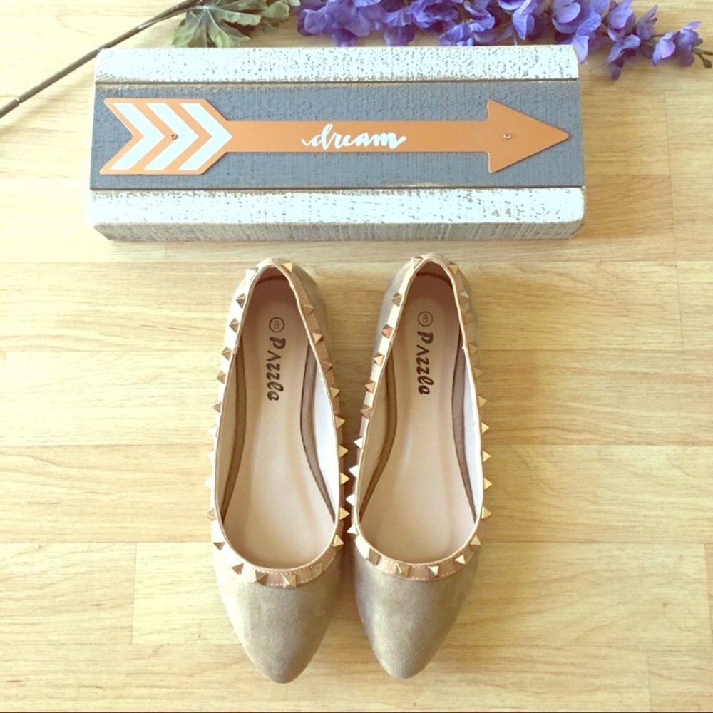 Tan with gold accent studs. Bought on Poshmark